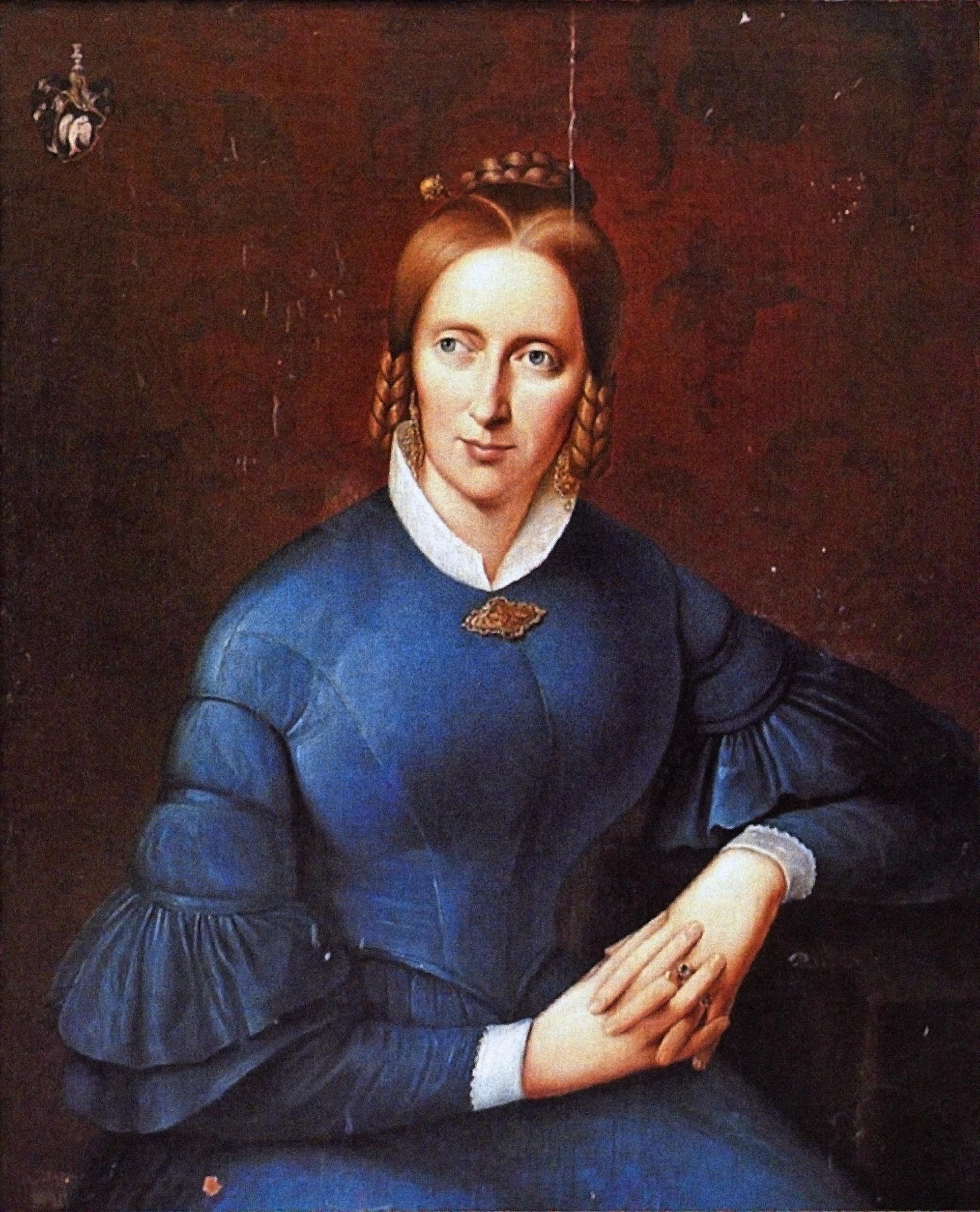 An oil painting of Annette von Droste Hülshoff, a white woman in a blue dress against a dark background