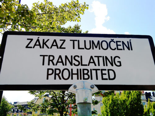 A sign reading zakaz tlumočeni – translating prohibited